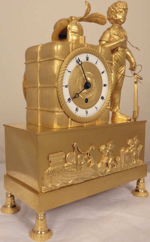 A small English Antique Regency nautical themed mantel clock Ian